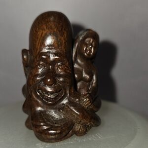 Vintage Japanese Carved Wood Netsuke in the Form of a God Next to Naked Woman